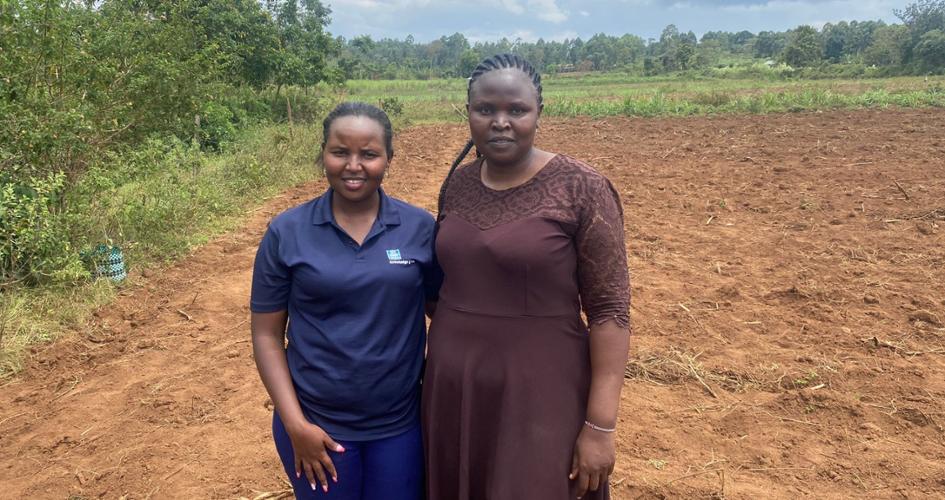 Winjoy Kendi and female farmer in East Africa